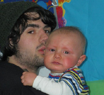 dad comforts baby